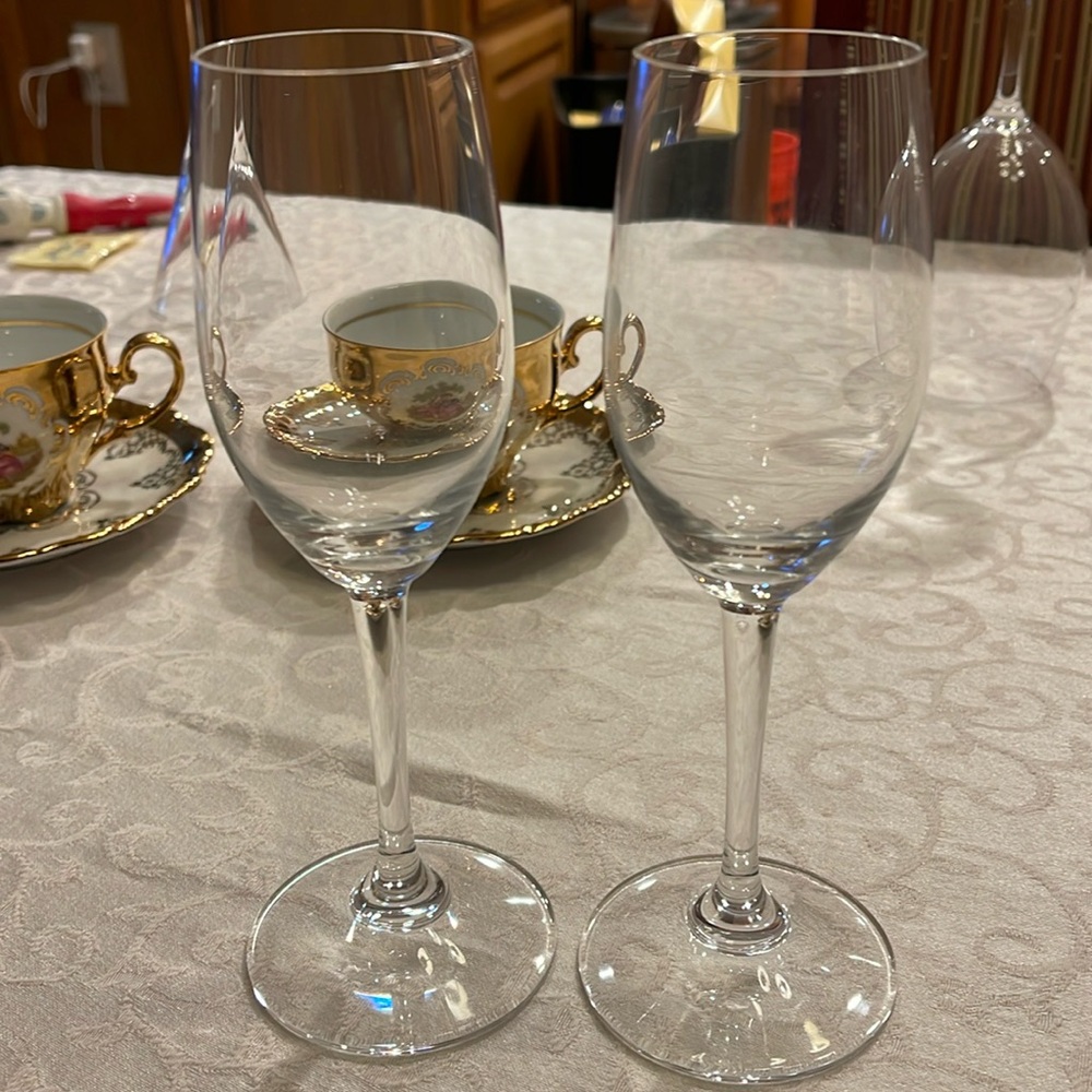 Set of 2 Riedel glasses 7 5/8 “ tall ,1 3/4” width signed